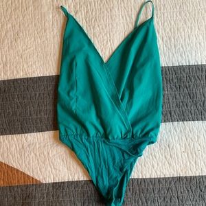 Low front and back thong bodysuit